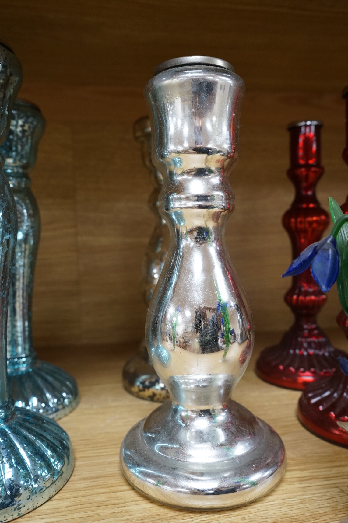Three pairs of mirrored glass candlesticks and two small glass floral displays, largest 26cm high